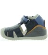 Navy dressy sandals for a boy with velcro adjust