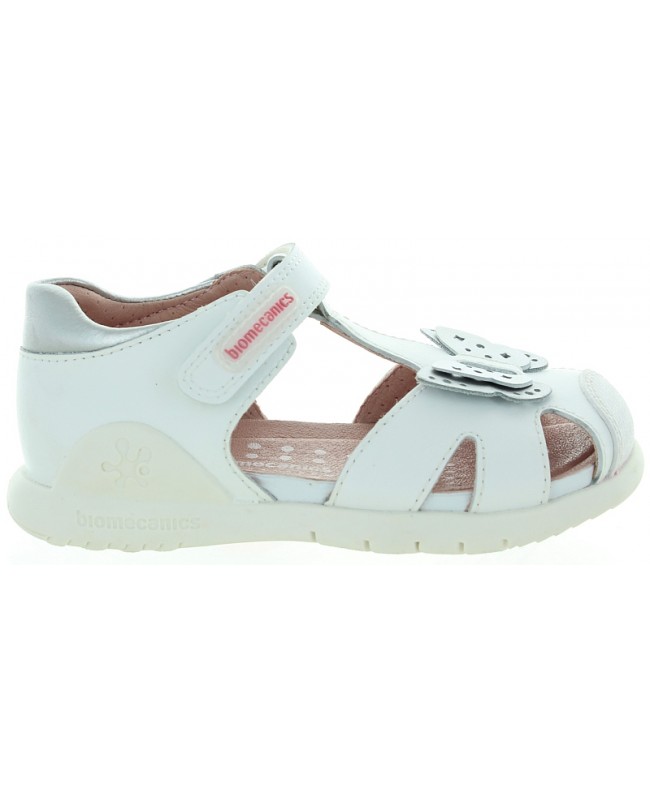 White leather sandals for a child with anke support 