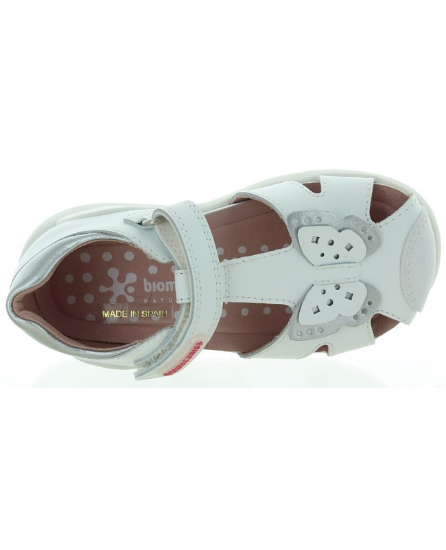 White leather sandals for a child with anke support 