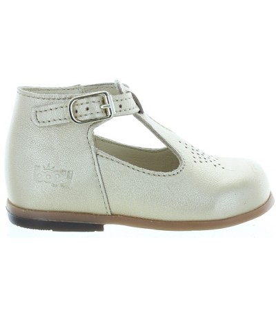 Gold leather dress shoes for a baby