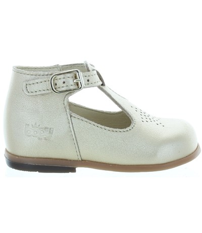 Gold leather dress shoes for a baby
