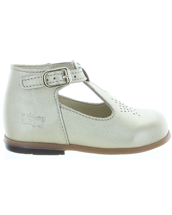 Gold leather dress shoes for a baby