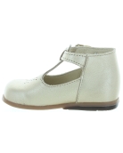 Gold leather dress shoes for a baby