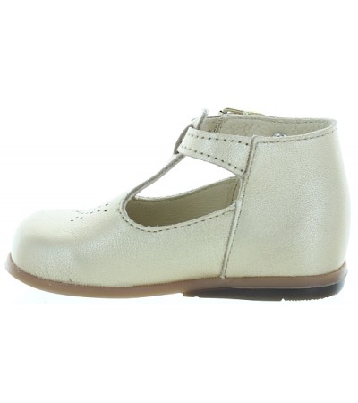 Gold leather dress shoes for a baby