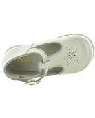 Gold leather dress shoes for a baby