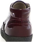 Red boots for child that are podiatric 