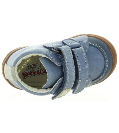 Blue ankle high top boots for a toddler 