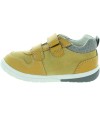 Yellow supportive sneakers for a toddler 