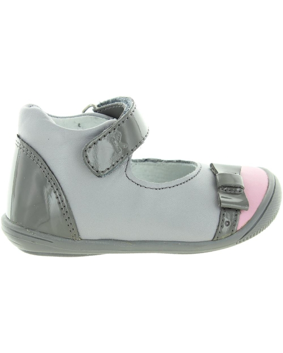 Special gray shoes for a toddler girl with high arches