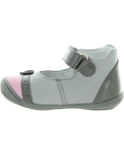 Special gray shoes for a toddler girl with high arches