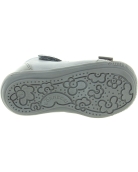 Special gray shoes for a toddler girl with high arches